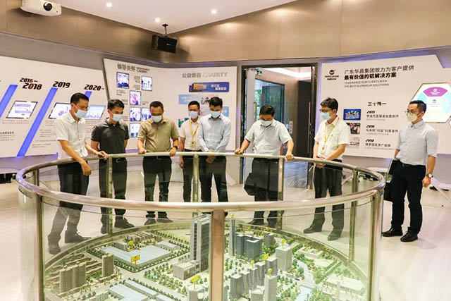 增强相助,互利共赢|肇庆市投资增进局一行来mg冰球突破集团调研